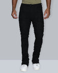 JET BLACK STACKED JEAN WITH FRINGE CUT AND SEW FROM TOP TO BOTTOM