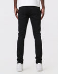 JET BLACK SKINNY JEAN WITH AZTEC PRINT BACKED RIPS AND PEWTER COLOR STARS