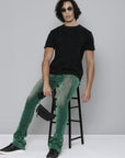 GREEN VELVET COATED STACKED JEAN
