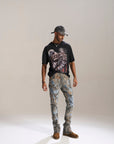 DESERT SUN CAMO ALL OVER PATCHWORK STACKED JEAN