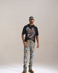 DESERT SUN CAMO ALL OVER PATCHWORK STACKED JEAN