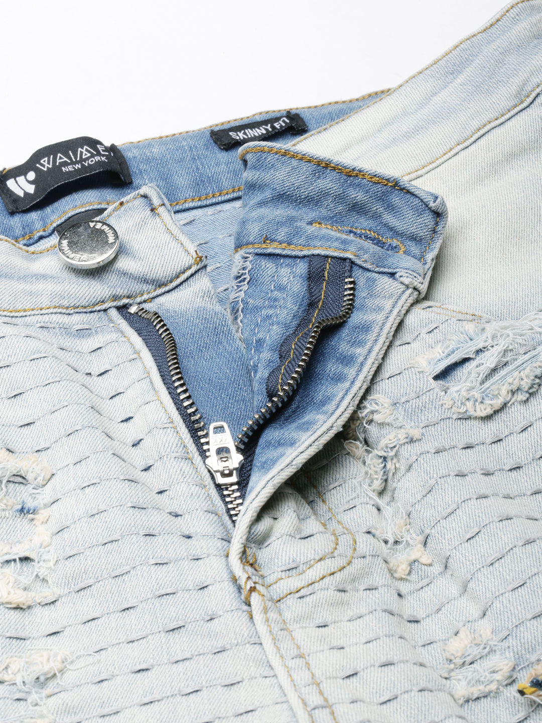 BLUE WASH SKINNY JEAN WITH TWEED PATCHES