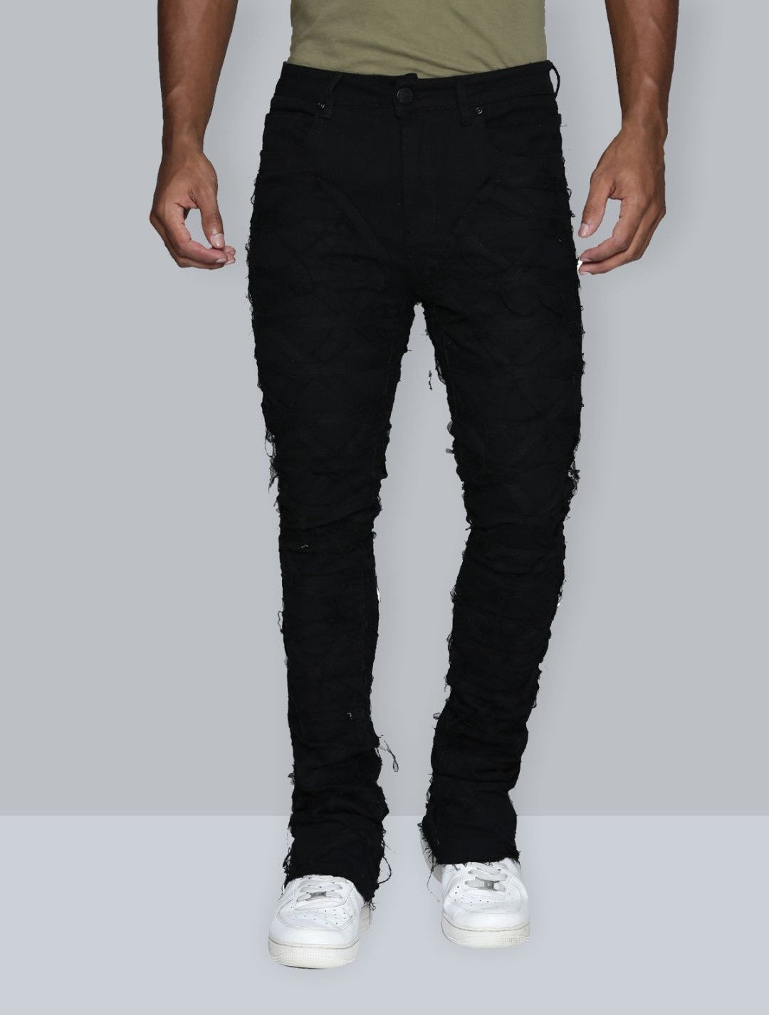 JET BLACK STACKED JEAN WITH FRINGE CUT AND SEW FROM TOP TO BOTTOM