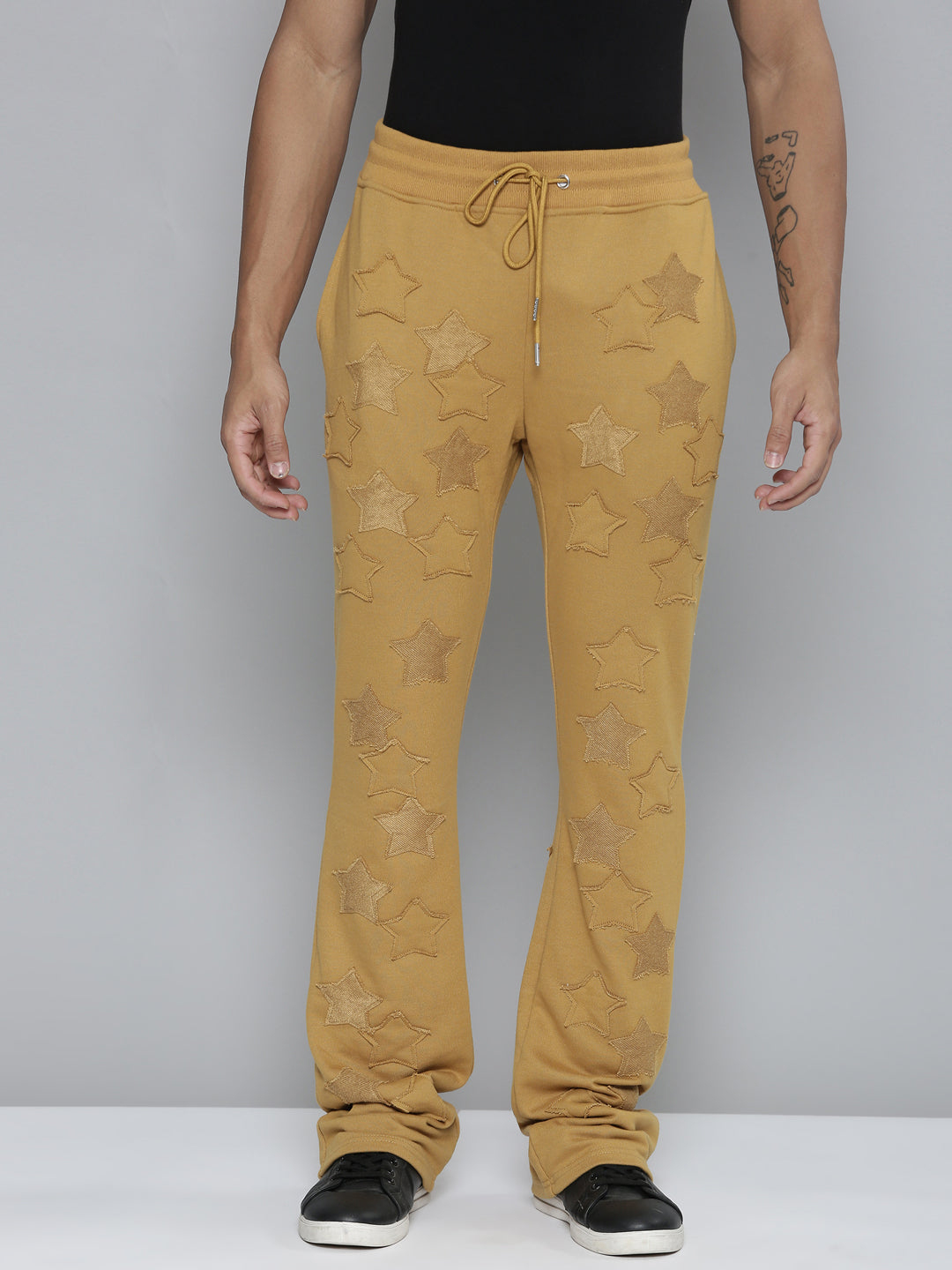 TIMBER STACKED TERRY PANTS WITH STAR PATCHES