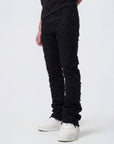 JET BLACK STACKED JEAN WITH FRINGE CUT AND SEW FROM TOP TO BOTTOM