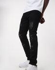 JET BLACK SKINNY JEAN WITH STUDDED BACKED RIPS