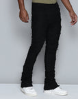 JET BLACK STACKED JEAN WITH FRINGE CUT AND SEW FROM TOP TO BOTTOM