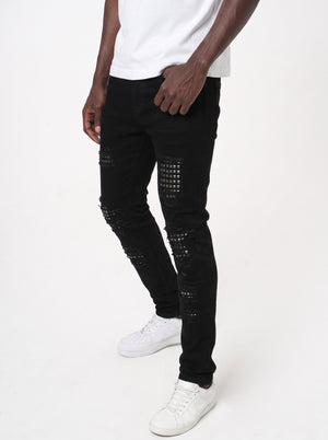 JET BLACK SKINNY JEAN WITH STUDDED BACKED RIPS