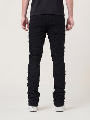 JET BLACK STACKED JEAN WITH FRINGE CUT AND SEW FROM TOP TO BOTTOM