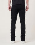 JET BLACK STACKED JEAN WITH FRINGE CUT AND SEW FROM TOP TO BOTTOM