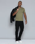 JET BLACK STACKED JEAN WITH FRINGE CUT AND SEW FROM TOP TO BOTTOM