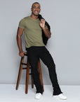 JET BLACK STACKED JEAN WITH FRINGE CUT AND SEW FROM TOP TO BOTTOM