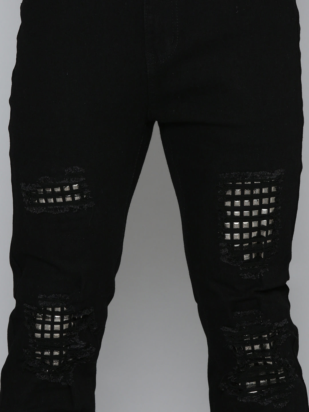 JET BLACK SKINNY JEAN WITH STUDDED BACKED RIPS
