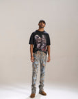 DESERT SUN CAMO ALL OVER PATCHWORK STACKED JEAN