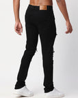 JET BLACK SKINNY JEAN WITH AZTEC PRINT BACKED RIPS AND PEWTER COLOR STARS